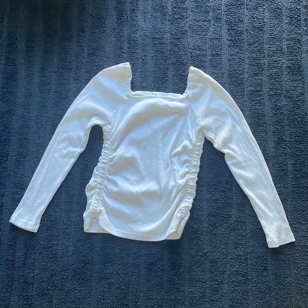 white long sleeve top